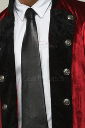 Classic long gothic velvet coat for men with dramatic cuffs, vintage silver buttons, and luxurious red and black fabric.