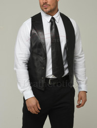Interior lining and adjustable buckle detail — leather waistcoat