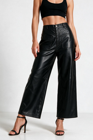Women's black high waisted wide leg real leather trousers with front patch pockets, styled with heeled sandals