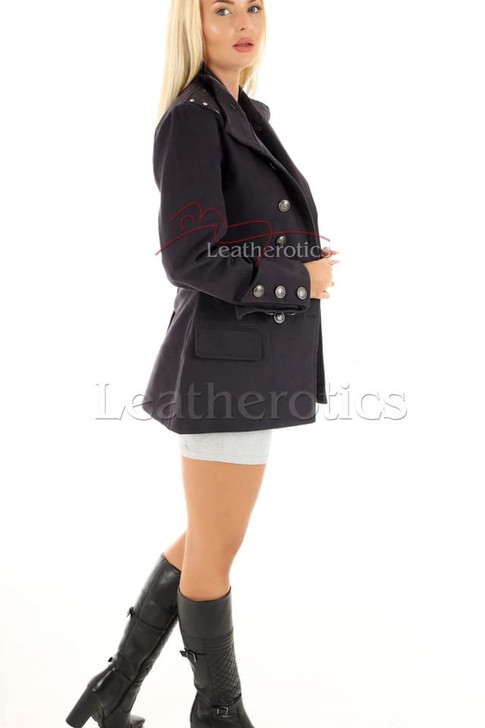 Side profile of fitted military blazer featuring structured silhouette and decorative cuff detailing