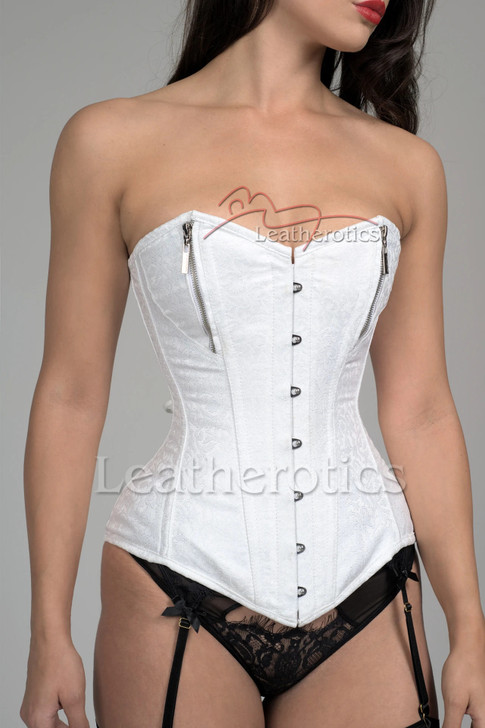Detailed shot of the polished front steel busk and the smooth top-edge binding of the white overbust corset, designed for comfort and durability.