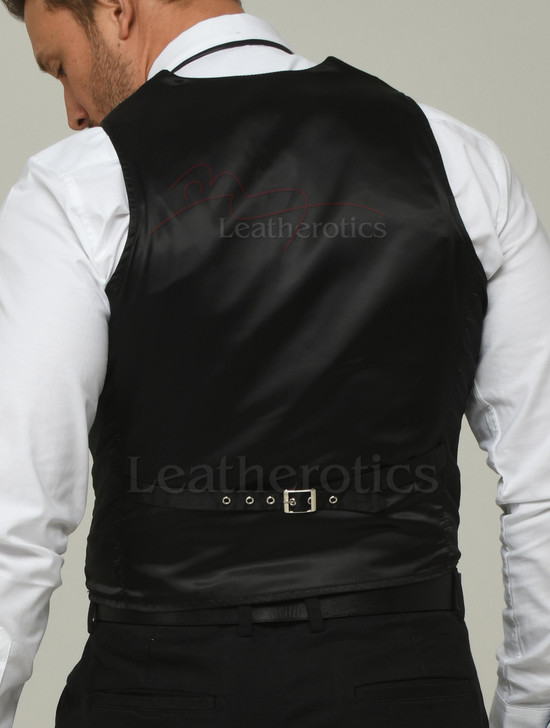 handcrafted leather tie
Model wearing leather waistcoat over white shirt — styled look