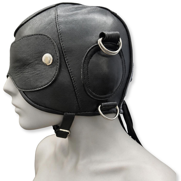 Obsidian Real leather hood side view showing padded ear panel, polished D-rings, adjustable chin strap, and removable eye cover.