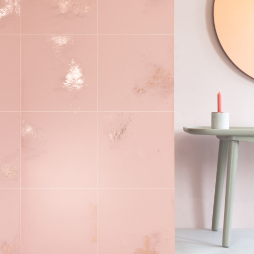 Pink wallpaper with copper fleck with a square line pattern over lay.