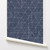 Graphic hand drawn lines on dark blue wallpaper roll.