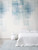 Veil wallpaper on a bedroom wall in blue.