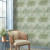 Green Orchard Wallpaper in a bright seating area.
