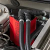 IAG cast aluminum AOS body showing integrated coolant ports and swirl pot design
