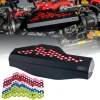 IAG black aluminum alternator cover with red hex accent plate on Subaru STI engine