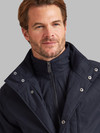 Men's coat with mock zip up gilet opening inside