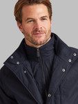 Men's coat with mock zip up gilet opening inside