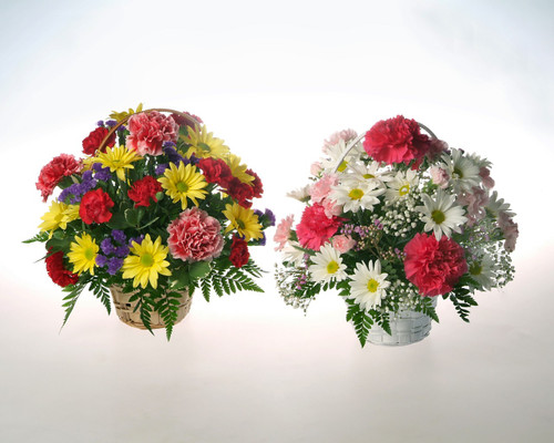 A wicker basket filled with bright and beautiful seasonal fresh flowers