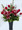 A classic combination of roses and lilies with a sophisticated look.