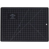 black side of 8-1/2" x 12" alvin professional self-healing cutting mat with white grid lines and measurements