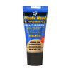 blue plastic tube of dap plastic wood all purpose wood filler in golden oak color with black screw cap