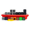 cubelets in black, green, red, tan, brown, and gray, arranged around red storage container with yellow brick adapters