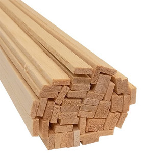 end of a bundle of light-colored balsa wood strips end of a bundle of light-colored balsa wood strips