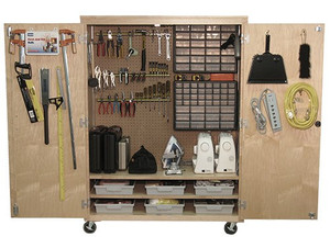 light brown wood tool cabinet with open doors full of various tools and storage bins for small and large objects light brown wood tool cabinet with open doors full of various tools and storage bins for small and large objects