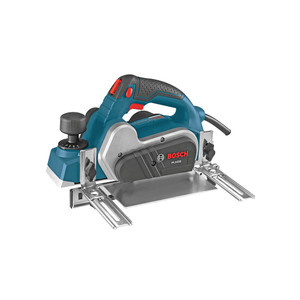 portable planer has blue handle with black grip between silver planer guidance system and white shavings bag
