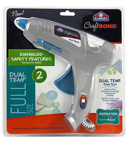 gray 40W glue gun with blue handle and tip in plastic blister package with cardboard backing paper gray 40W glue gun with blue handle and tip in plastic blister package with cardboard backing paper