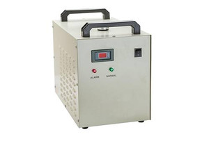 white metal box with two black handles on top, vents on the left, and red and green lights on front white metal box with two black handles on top, vents on the left, and red and green lights on front