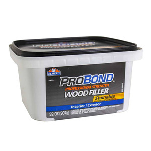 gray plastic 32 ounce container with black lid and label saying probond professional strength wood filler gray plastic 32 ounce container with black lid and label saying probond professional strength wood filler