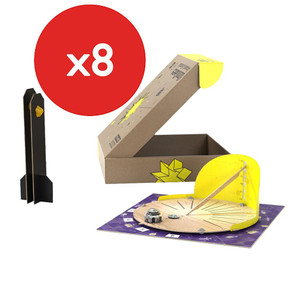 Ozobot Ozogoes Around A Sundial kit has wooden platform on purple mat and is fully assembled next to cardboard box