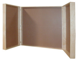 brown cabinet with two open doors lined with pegboard for storing tools