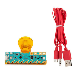 chibitronics love to code package containing chibi chip microcontroller board and red power cable