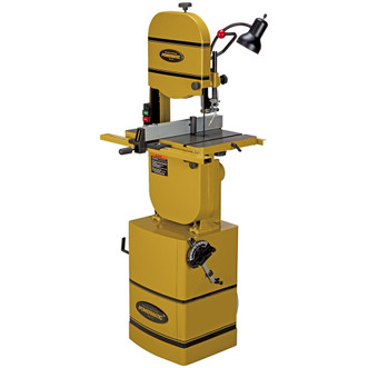 yellow powermatic band saw has adjustable miter gauge, rip fence blade, work lamp, chip blower and riser block