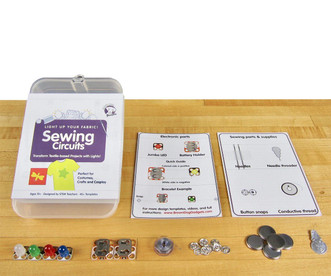 all pieces included in the Brown Dog Gadgets Sewing Circuits Standard Kit next to plastic storage box