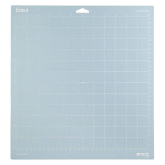 light blue 12" x 12" reusable mat with white grid lines for supporting material while using Cricut machine