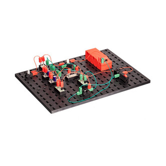 black electronics board with red and green circuits connecting to each other to power led bulbs