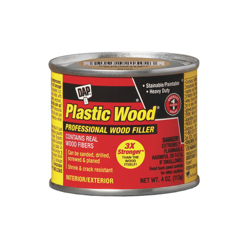 red 4 ounce metal can of Dap Plastic Wood Solvent-based Professional Wood Filler in pine color