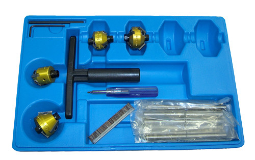Tungsten carbide-bladed valve seat cutter set with t-wrench, accessories and blue molded plastic case