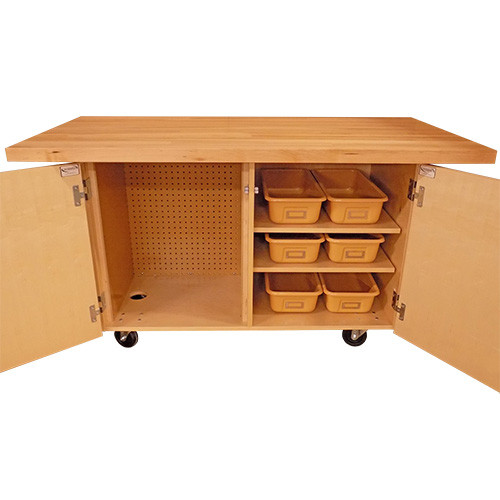 wooden work bench has 1-3/4" thick table top with two open cabinets to reveal six plastic organizational trays