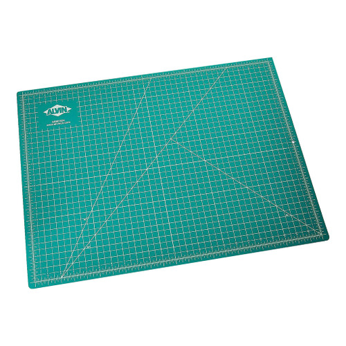 green side of 18" x 24" alvin professional self-healing cutting mat with white grid lines and measurements