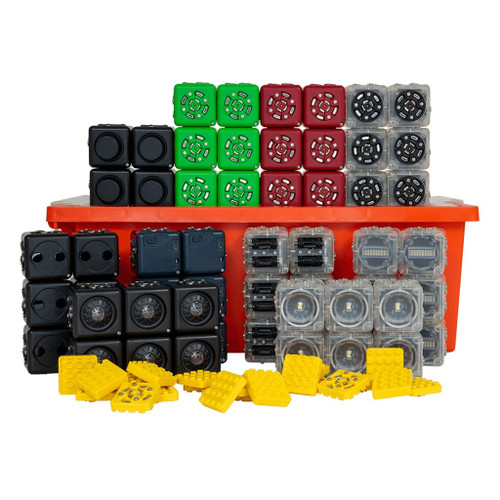 cubelets in black, green, red, and gray, arranged around orange storage container with yellow brick adapters