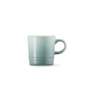 A blue espresso mug from the side