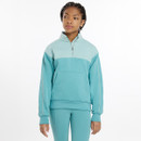 A person wearing a stylish turquoise zip-up jumper with a large front pocket, paired with matching fitted leggings.