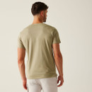 The back of a man wearing a sand-coloured short-sleeved t-shirt.