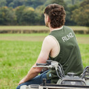 A man from behind wearing an olive vest top
