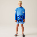 A child wearing a turquoise towel robe with shorts and flip flops.
