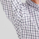 A close up view of an ergonomic underarm panel on a Ridgeline Sedgebrook check shirt in navy