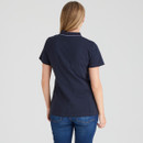 A back view of a woman wearing a navy Ridgeline Kilworth polo shirt