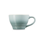 A pale blue mug from the side