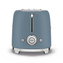 A modern blue toaster with a shiny silver base, featuring one slot, control buttons, and a circular "STOP" button.