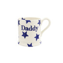 A view of a white mug with blue stars and Daddy written in blue writing on a white background