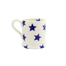 A view of a white mug with blue stars and Daddy written in blue writing on a white background