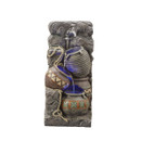 A water feature with a tap pouring into jugs with LEDs